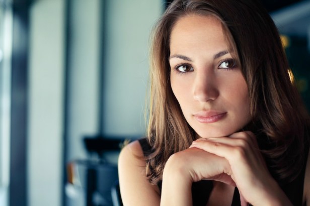 Young beautiful woman portrait in cafe